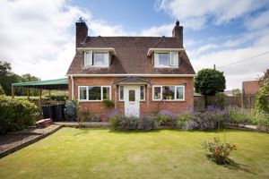 21 Orchard Close_Front Aspect (1)- click for photo gallery